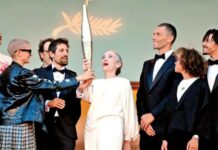 Una llama digna del séptimo arte; antorcha de París 2024 desfila por la alfombra de Cannes